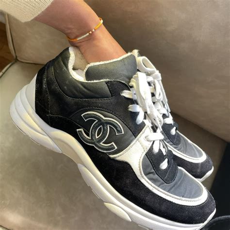 chanel trainers women black|Chanel black trainers white sole.